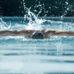 A swimmer doing a butterfly stroke.